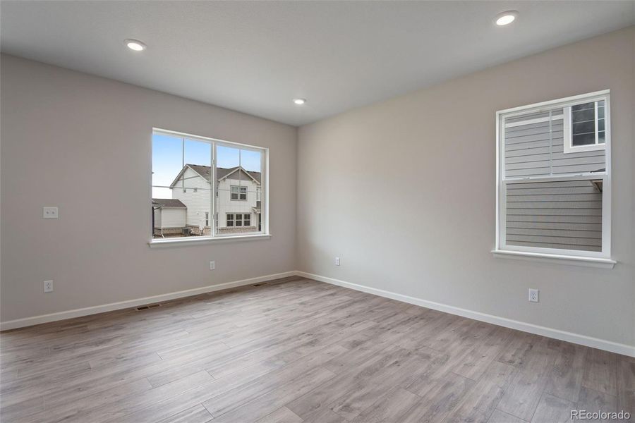 Spacious, unfurnished interior of a new home in Ensemble at The Aurora Highlands, Aurora (Image 16).