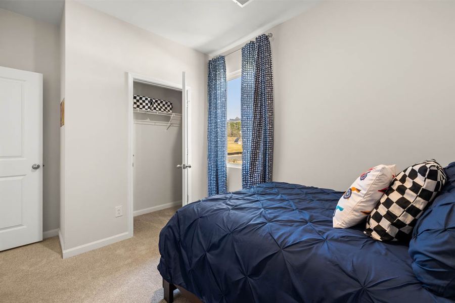 Representative furnished interior of a home built from the Calloway 3 by D.R. Horton in Byrd Village, Graniteville (Image 32).