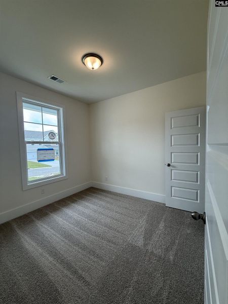 Spacious, unfurnished interior of a new home in Cottages at Roofs Pond, West Columbia (Image 52).