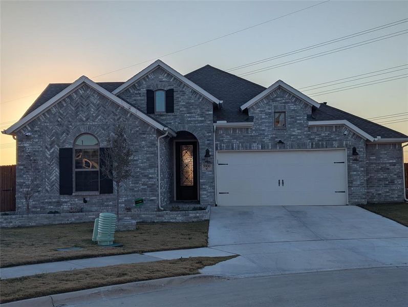 French country style house featuring a garage