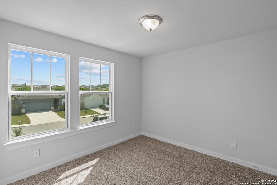 Spacious, unfurnished interior of a new home in The Meadows at Hunters Ranch, San Antonio (Image 12).