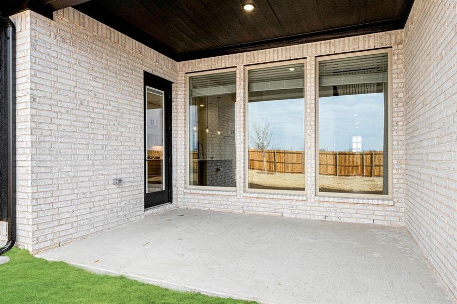 Exterior details and patio area of a home in Willow Wood, McKinney (Image 28).
