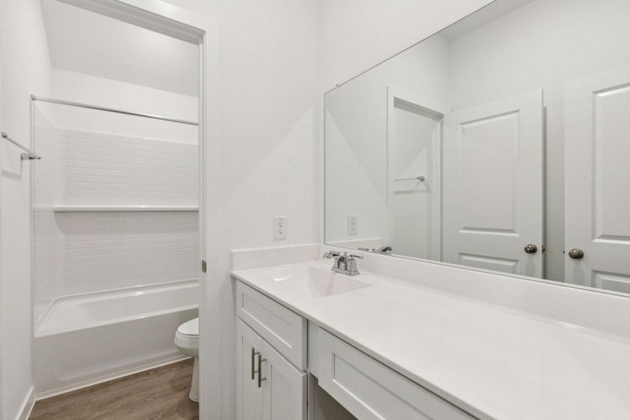 Furnished interior view inside a new home in Mavera, Conroe (Image 12).