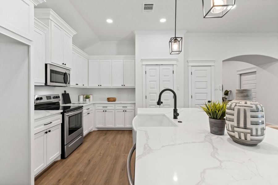 Photos are of a similar home – actual finishes and features may differ.