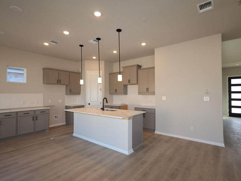 Furnished interior view inside a new home in Heritage, Dripping Springs (Image 9).
