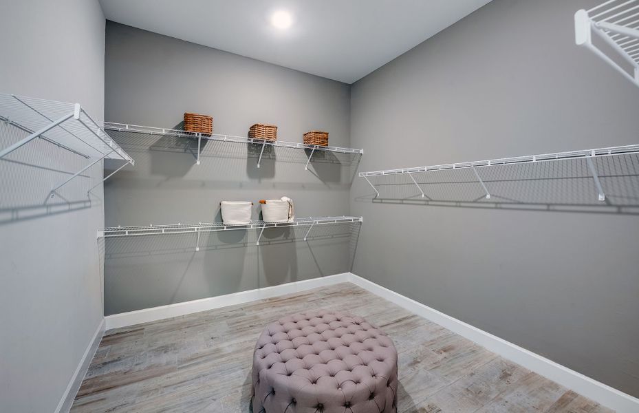 Spacious walk-in closet Spacious walk-in closet