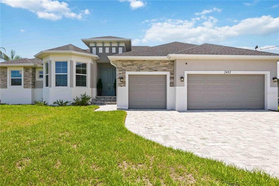 Front exterior of a new home in , Port Charlotte, FL, highlighting curb appeal (Image 26).