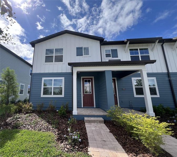 Exterior details and patio area of a home in Northlake Townhomes, Winter Garden (Image 19). Exterior details and patio area of a home in Northlake Townhomes, Winter Garden (Image 19).