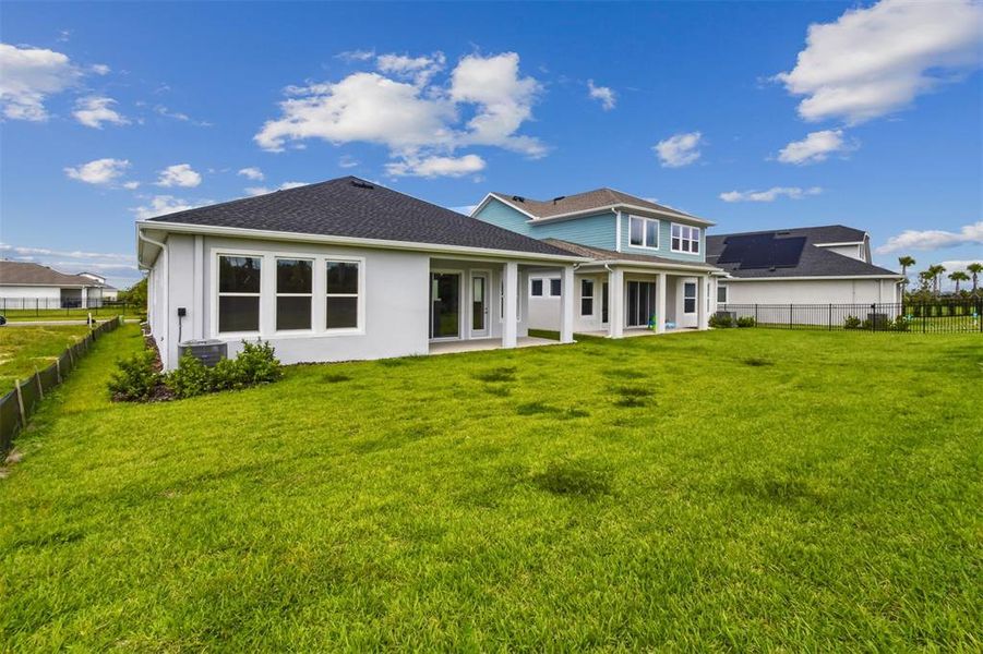 Exterior details and patio area of a home in Waterset Classic Series, Apollo Beach (Image 25).