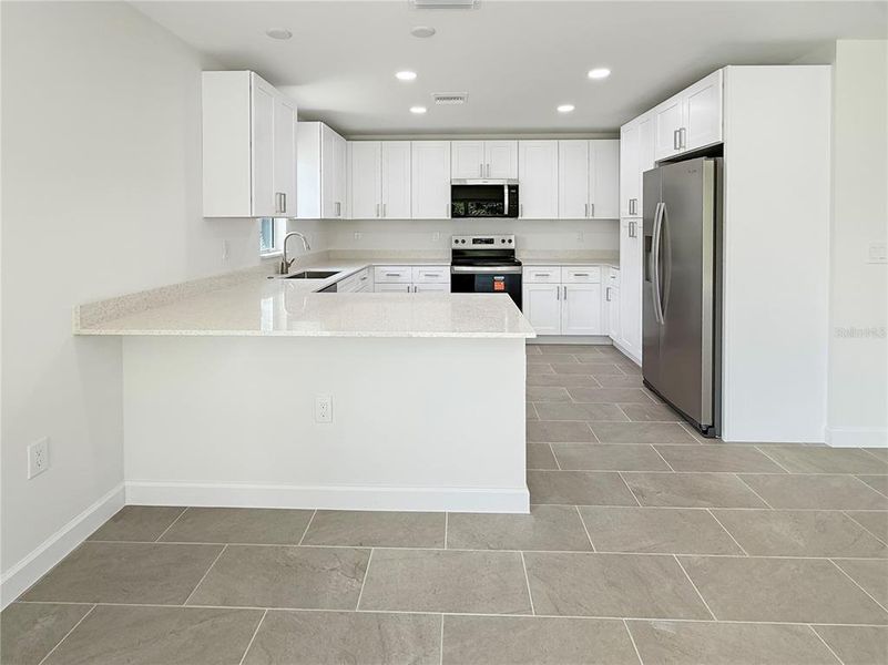 Furnished interior view inside a new home in , Punta Gorda (Image 7).