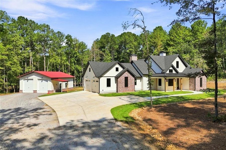 Front exterior of a new home in , Canton, GA, highlighting curb appeal (Image 28).
