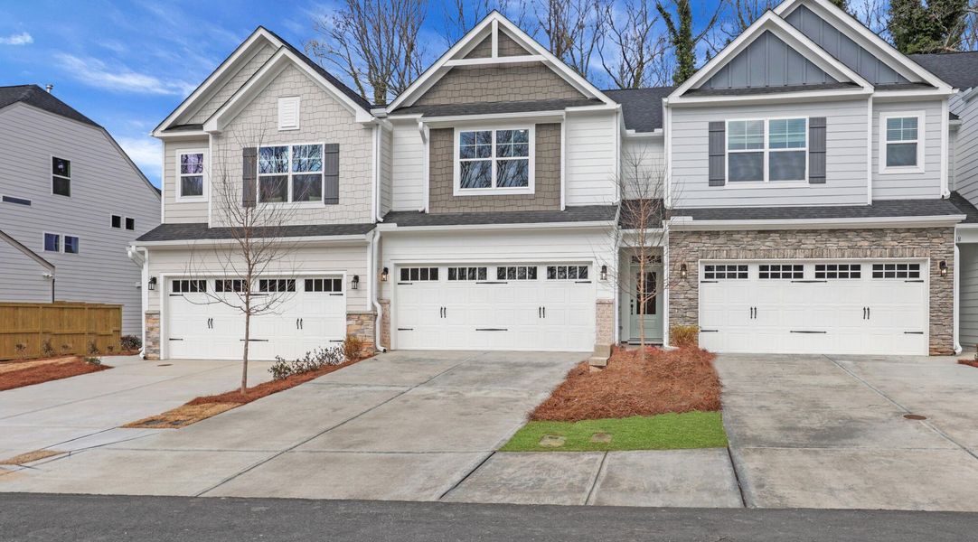 Front exterior of a new home in Villas at Dawsonville Townhomes, Dawsonville, GA, highlighting curb appeal (Image 2).