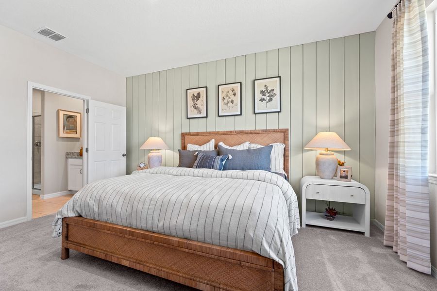 Spacious Primary Bedroom of The Juniper at Country Club Estates