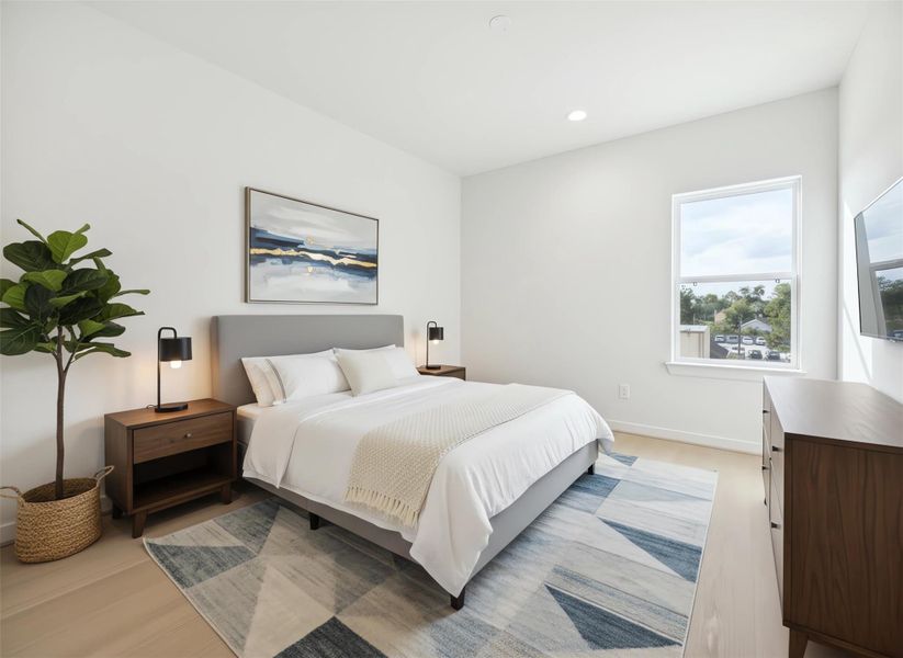 Spacious third-floor game room with abundant natural light and flexible layout, perfect for entertaining, play, or a media retreat. *Virtually staged*