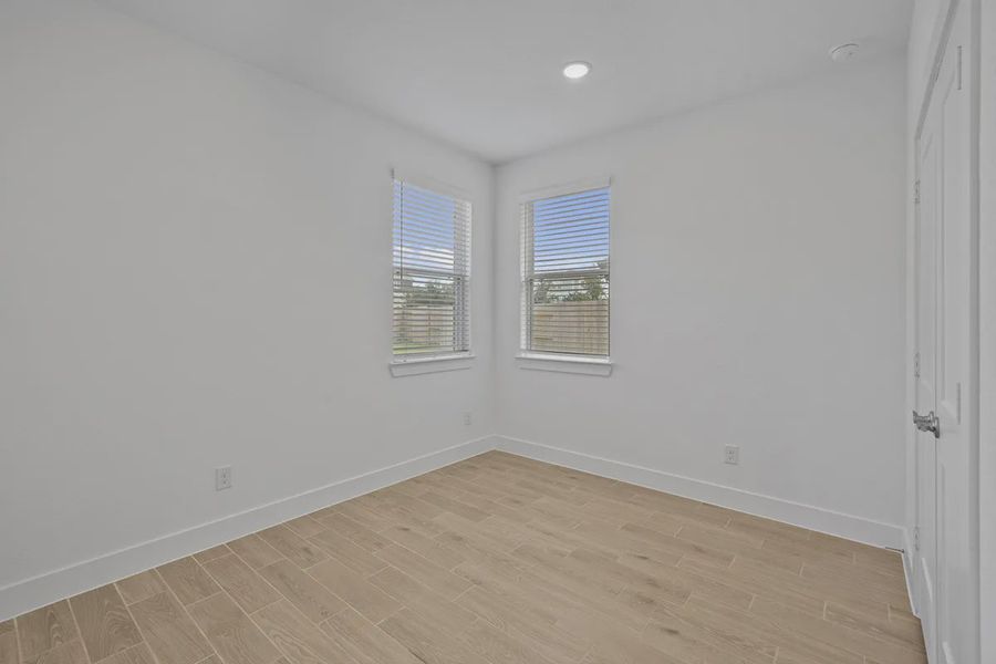 Spacious, unfurnished interior of a new home in Elyson Courtyard Collection, Katy (Image 13).