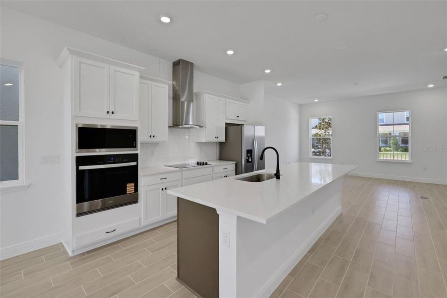 Furnished interior view inside a new home in Serenade at Ovation, Winter Garden (Image 10). Furnished interior view inside a new home in Serenade at Ovation, Winter Garden (Image 10).