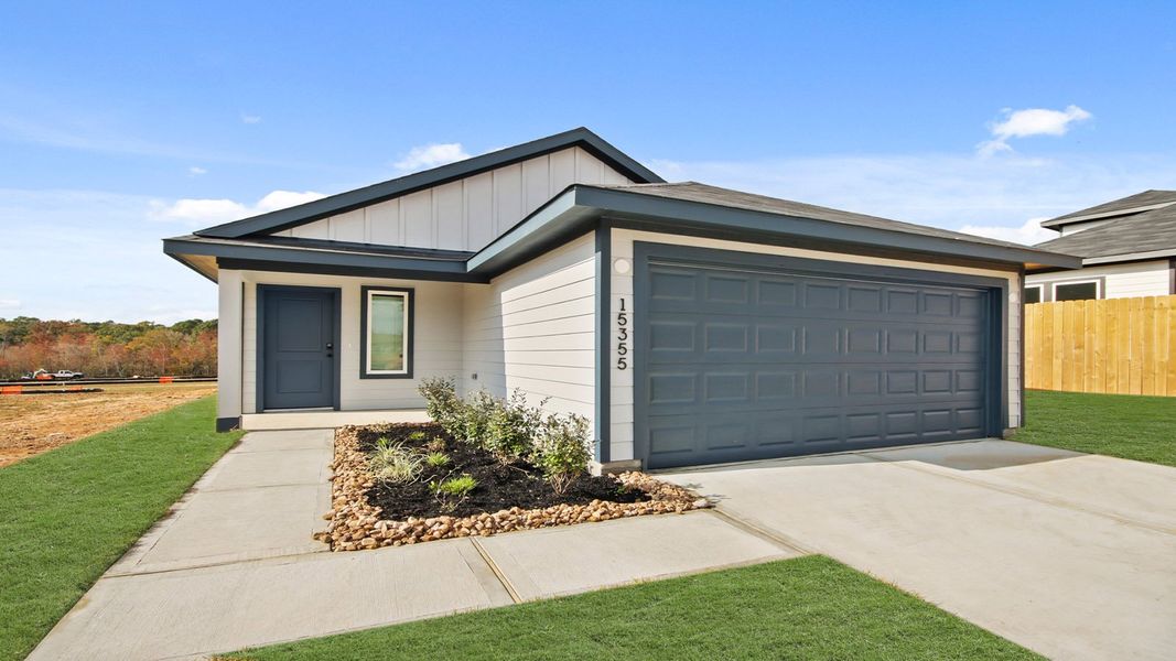 Representative exterior photo of a completed home built from the Amber by D.R. Horton in Lake Conroe Cove, Willis, TX (Image 2). Representative exterior photo of a completed home built from the Amber by D.R. Horton in Lake Conroe Cove, Willis, TX (Image 2).