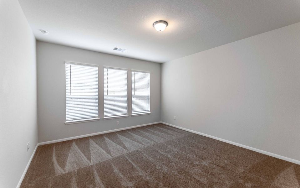 Spacious, unfurnished interior of a new home in Canterra Creek, Iowa Colony (Image 22). Spacious, unfurnished interior of a new home in Canterra Creek, Iowa Colony (Image 22).