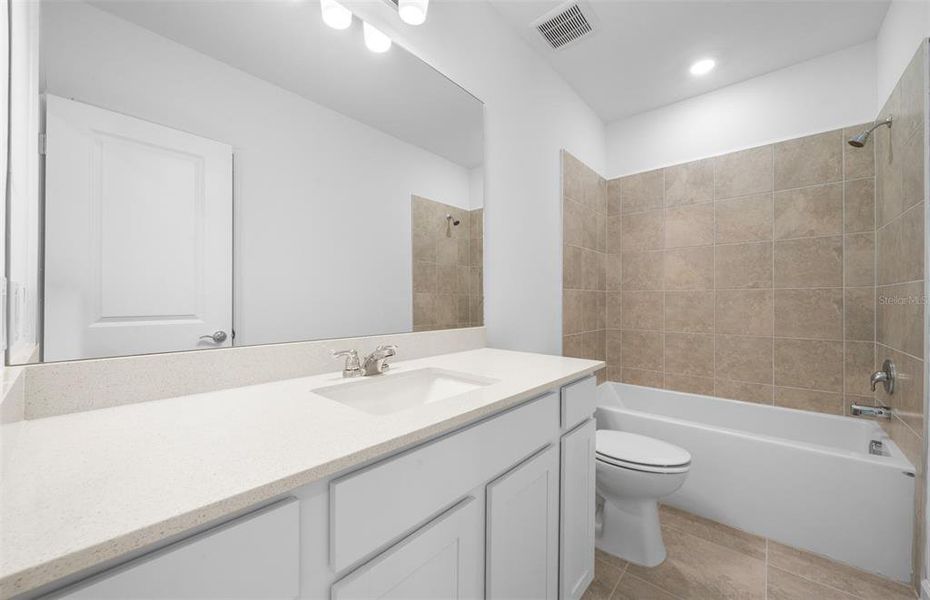 Furnished interior view inside a new home in Reagan Landing, Bradenton (Image 10). Furnished interior view inside a new home in Reagan Landing, Bradenton (Image 10).
