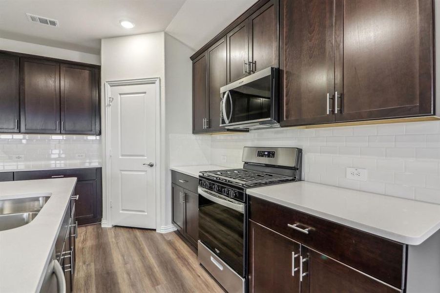 Photo is not of the actual home, but is an inspirational photo of builder’s model home and may depict options, furnishings, and/or decorator features that are not included.