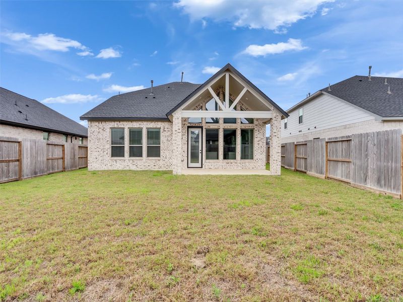 Exterior details and patio area of a home in Cross Creek West, Fulshear (Image 25).