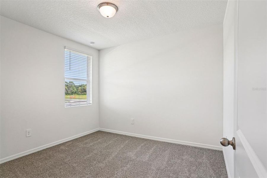 Spacious, unfurnished interior of a new home in Ridgehaven - Villas, Ormond Beach (Image 24).