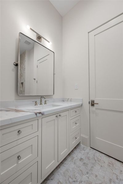 Secondary bathroom near the Media /  Game room.