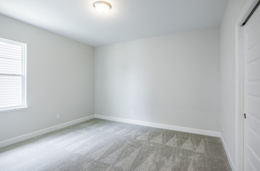 Representative unfurnished interior of a home built from the The Prescott by Cothran Homes in Holly Ridge, Greenville (Image 21).