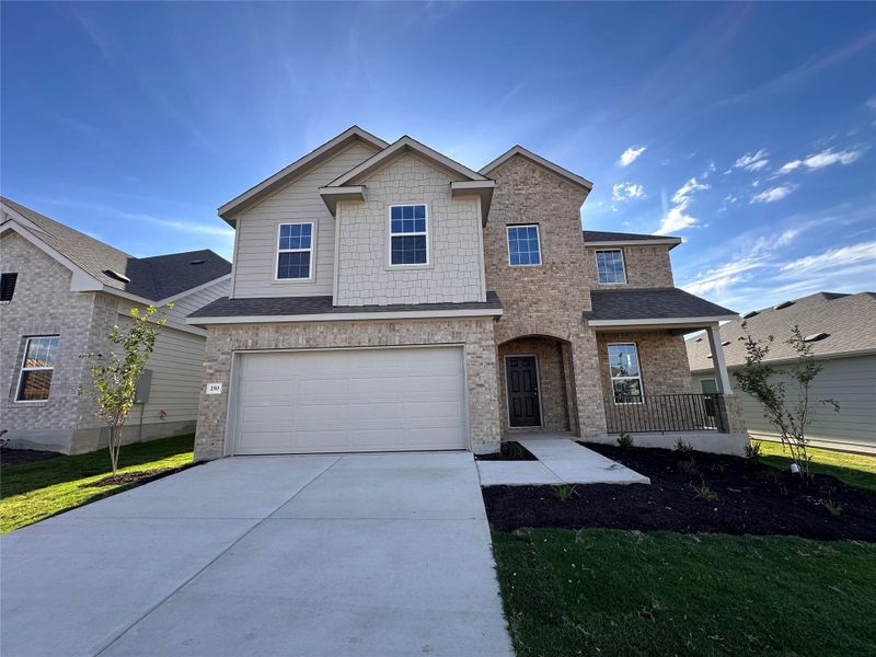 View of front of property featuring driveway, brick siding, covered porch, a garage, and roof with shingles View of front of property featuring driveway, brick siding, covered porch, a garage, and roof with shingles