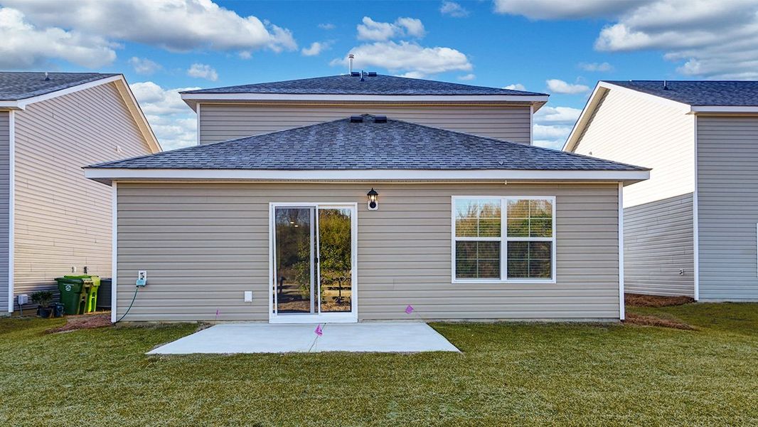 Exterior details and patio area of a home in Hunter's Branch, Hopkins (Image 3).