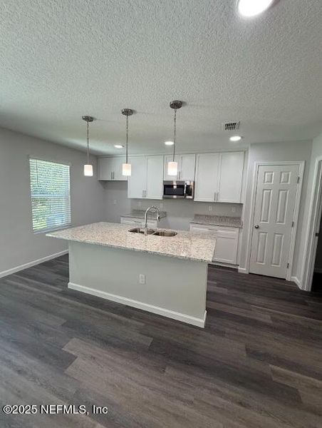 Furnished interior view inside a new home in , Jacksonville (Image 4). Furnished interior view inside a new home in , Jacksonville (Image 4).