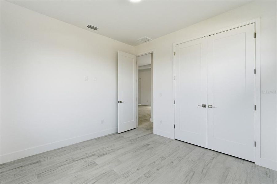 Spacious, unfurnished interior of a new home in , Port Charlotte (Image 41).