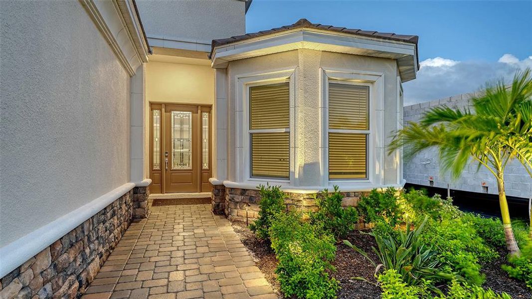 Exterior details and patio area of a home in Esplanade at Azario Lakewood Ranch, Lakewood Ranch (Image 34).