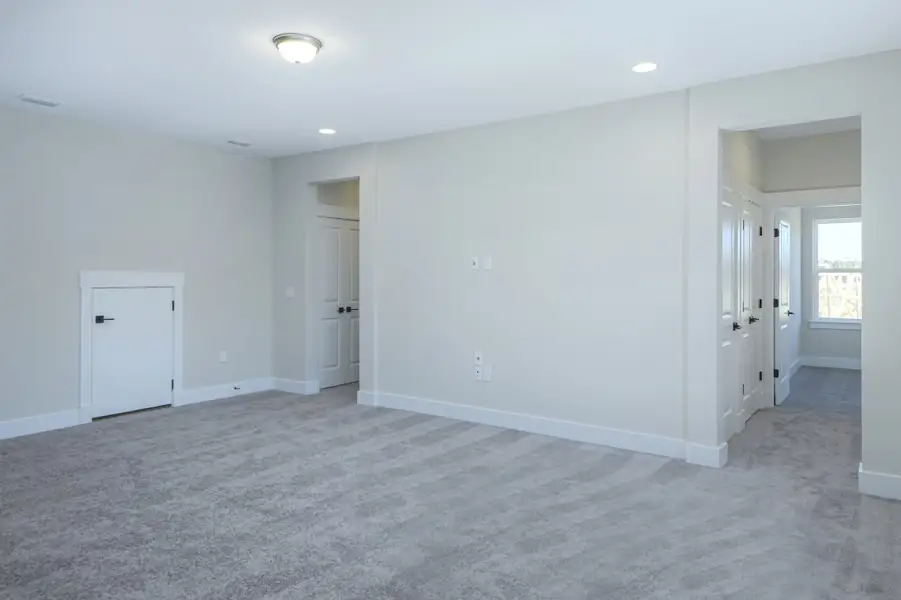 Representative unfurnished interior of a home built from the Julington by Riverside Homes in Hidden Creek at SilverLeaf 70' Series, St. Augustine (Image 17).