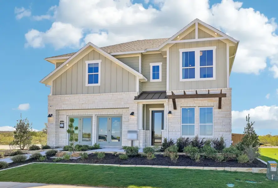 Representative exterior photo of a completed home built from the Graham by Ashton Woods in The Trails at Carmel, Pflugerville, TX (Image 22). Representative exterior photo of a completed home built from the Graham by Ashton Woods in The Trails at Carmel, Pflugerville, TX (Image 22).