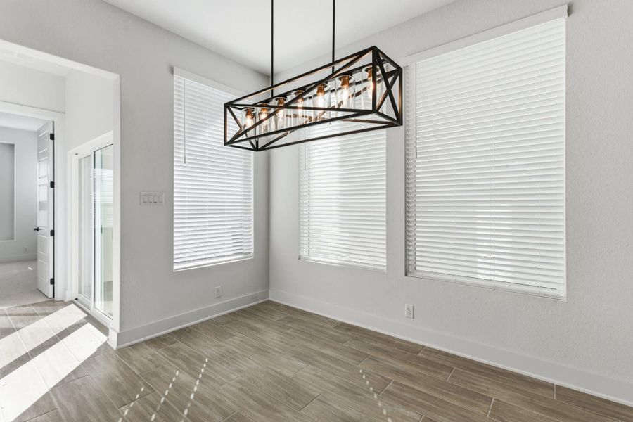 Spacious, unfurnished interior of a new home in Centero at Stone Oak, San Antonio (Image 24).