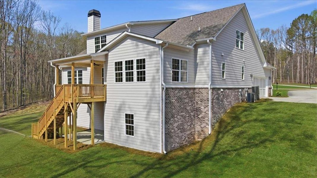 Exterior details and patio area of a home in Bradley Gin, Monroe (Image 36).