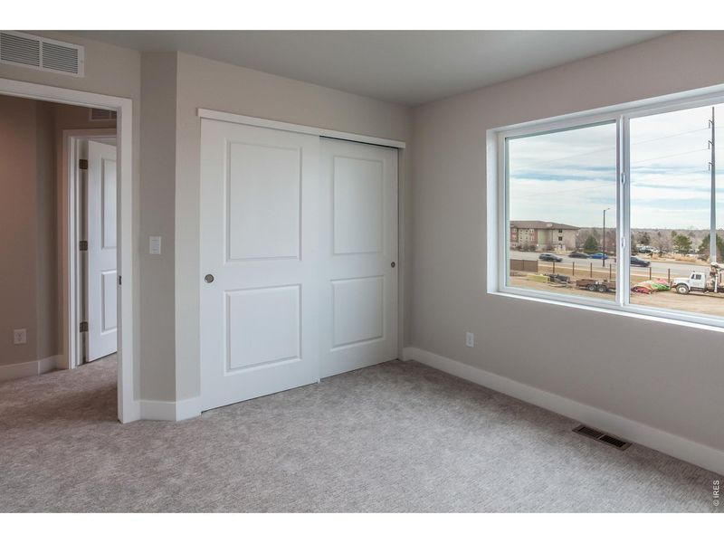 Spacious, unfurnished interior of a new home in Wilson Commons, Loveland (Image 23).