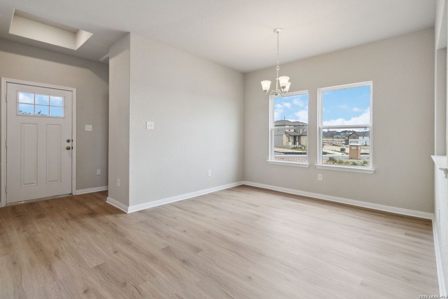 Spacious, unfurnished interior of a new home in Hunters Ranch, San Antonio (Image 13).