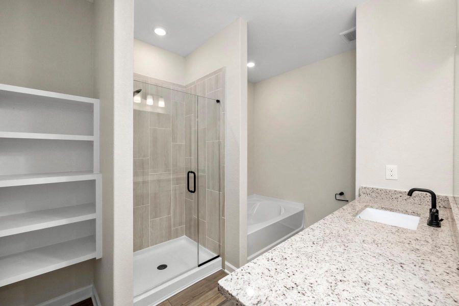 Furnished interior view inside a new home in Sunterra, Katy (Image 7).