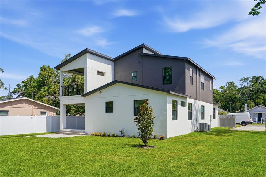 Front exterior of a new home in , St. Petersburg, FL, highlighting curb appeal (Image 32). Front exterior of a new home in , St. Petersburg, FL, highlighting curb appeal (Image 32).