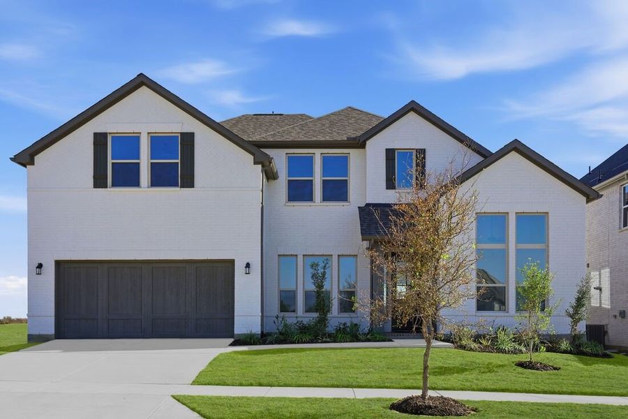 Representative exterior photo of a completed home built from the Peridot by Taylor Morrison in The Ranch at Uptown Celina 60s, Celina, TX (Image 1). Representative exterior photo of a completed home built from the Peridot by Taylor Morrison in The Ranch at Uptown Celina 60s, Celina, TX (Image 1).