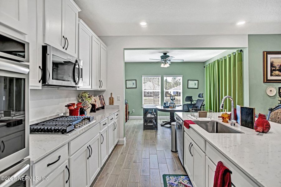 Furnished interior view inside a new home in Tributary: Lakeview at Tributary 60's, Yulee (Image 7).