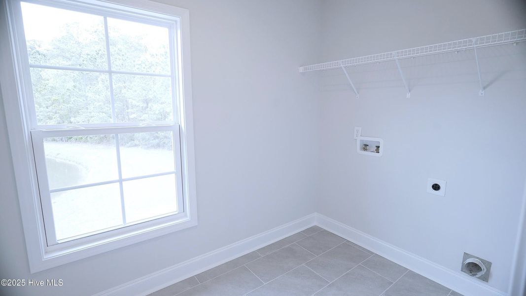 Spacious, unfurnished interior of a new home in Palmetto Creek, Bolivia (Image 24).