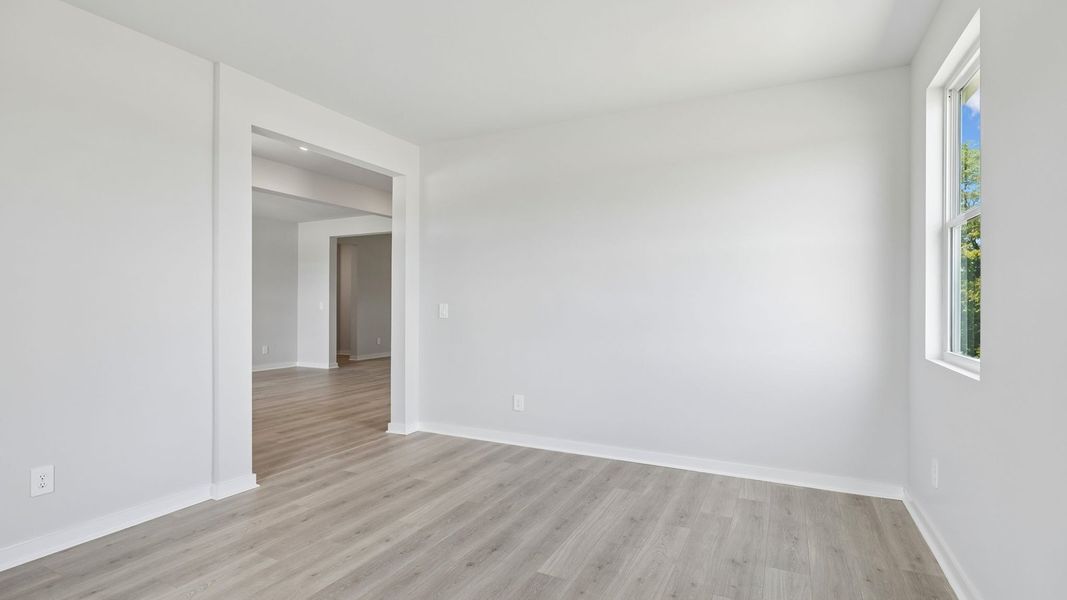 Representative unfurnished interior of a home built from the Ansley by D.R. Horton in Harvest Point, Spring Hill (Image 42).