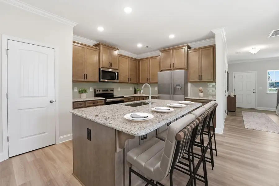 Furnished interior view inside a new home in Bell Meadows, Winnabow (Image 5).