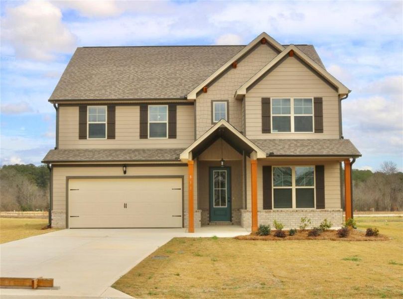 Front exterior of a new home in , Bonaire, GA, highlighting curb appeal (Image 24).