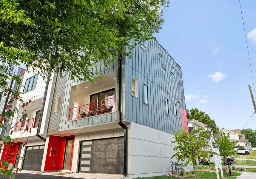 Front exterior of a new home in , Charlotte, NC, highlighting curb appeal (Image 1).
