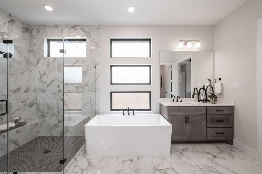 Representative furnished interior of a home built from the Carignan by Tri Pointe Homes in Woodson’s Reserve, Spring (Image 64).