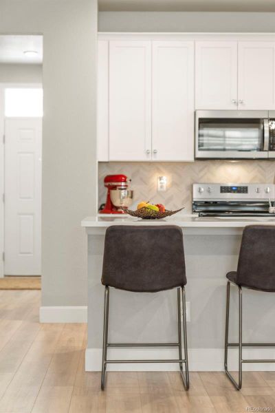 Furnished interior view inside a new home in Murphy Creek, Aurora (Image 12).